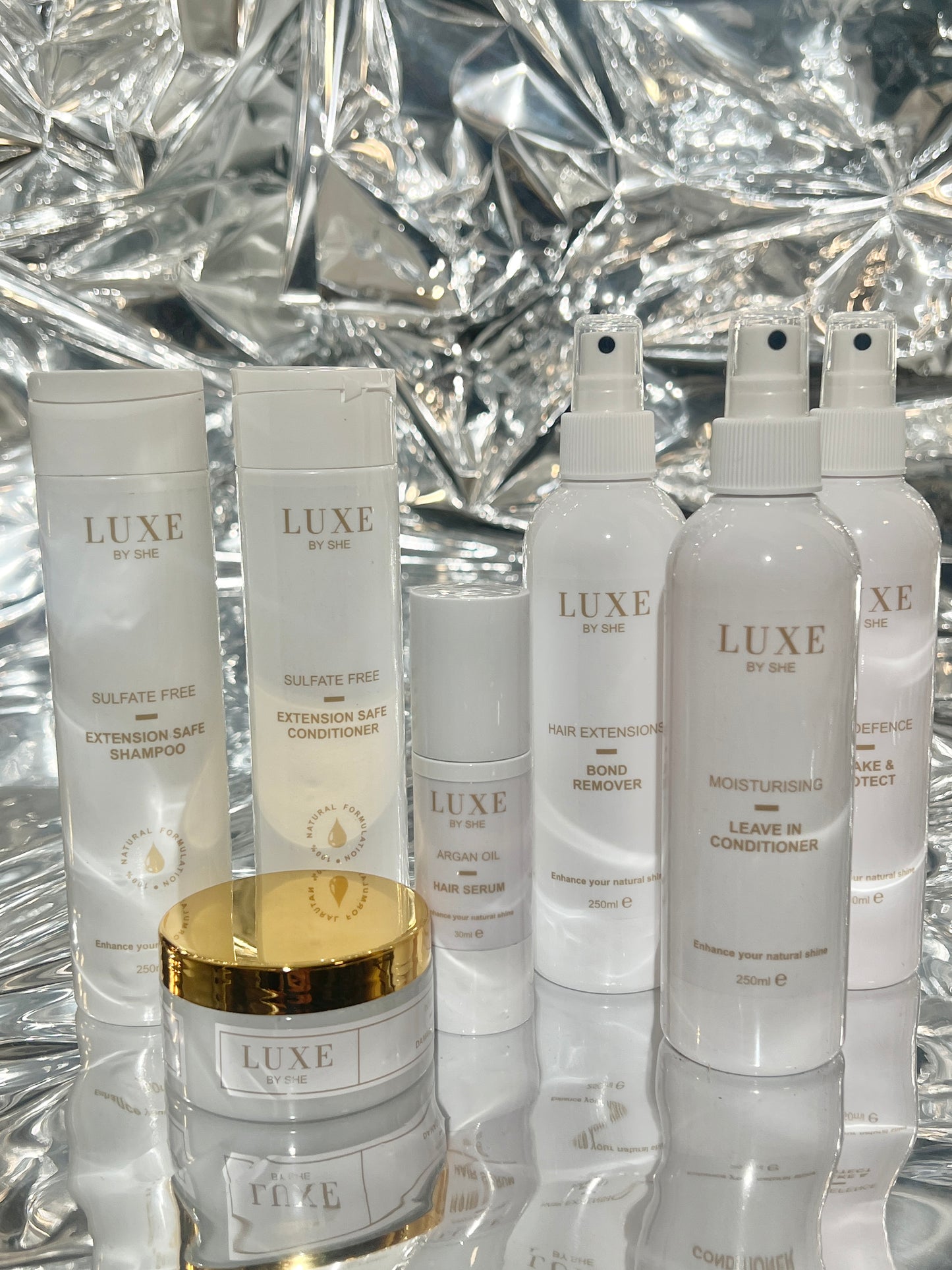 Hair extensions remover spray