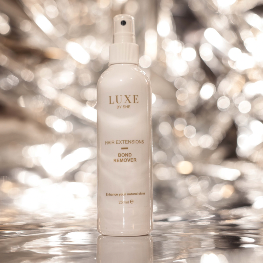 Hair extensions remover spray