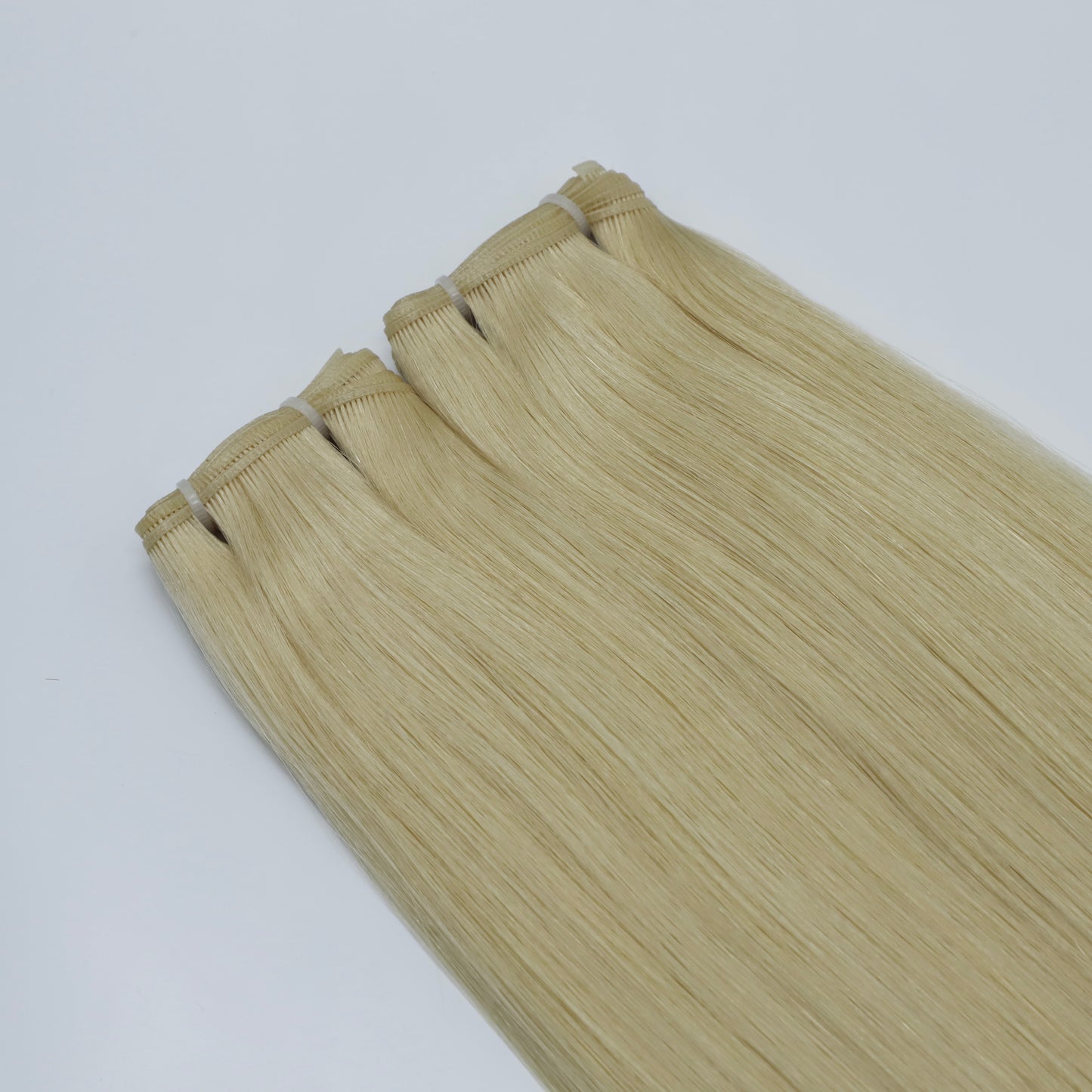 24" Genius Weft #12C Champagne Blonde Human Hair Extensions - Lucy