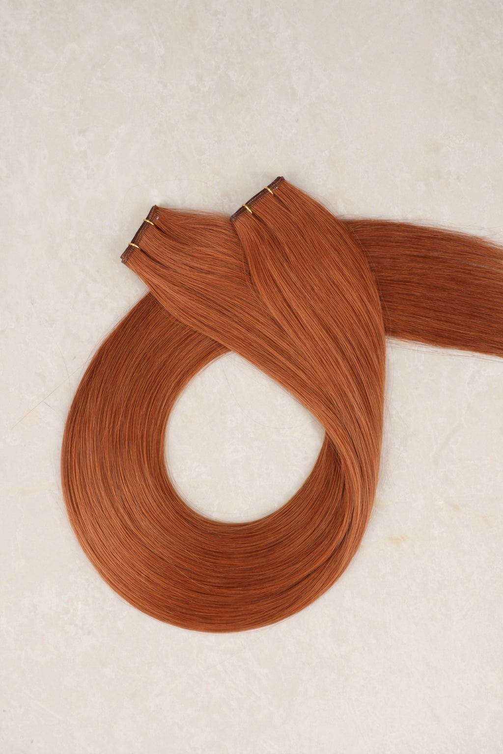 18" Genius Weft Human Hair Extensions. Copper