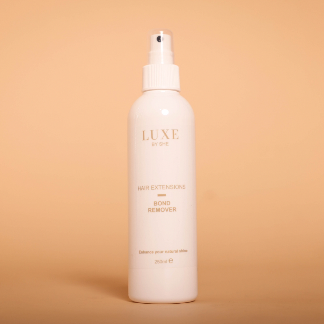 Hair extensions remover spray