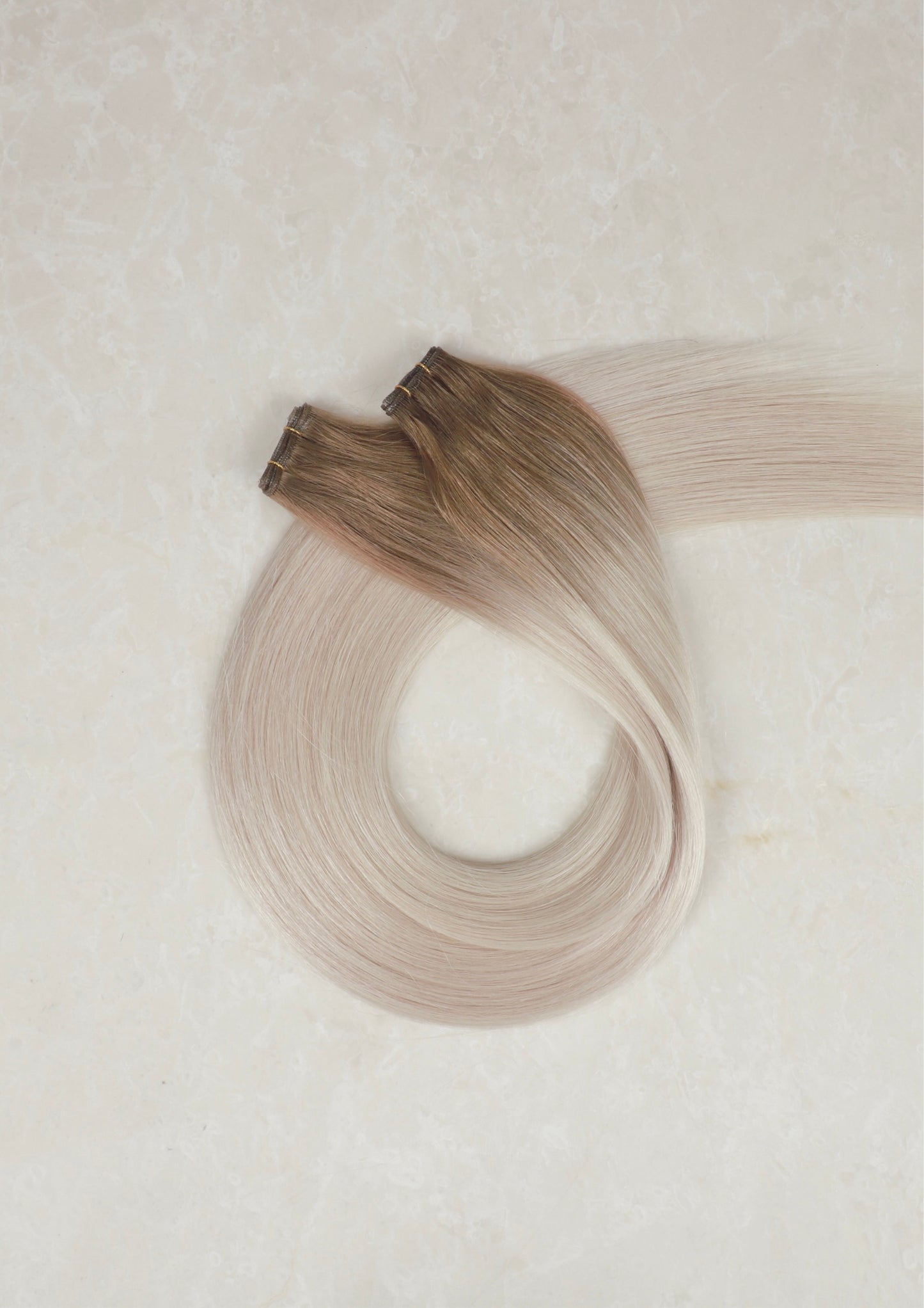 28" Genius Weft Human Hair Extensions. Rooted White Blonde #T18/1004