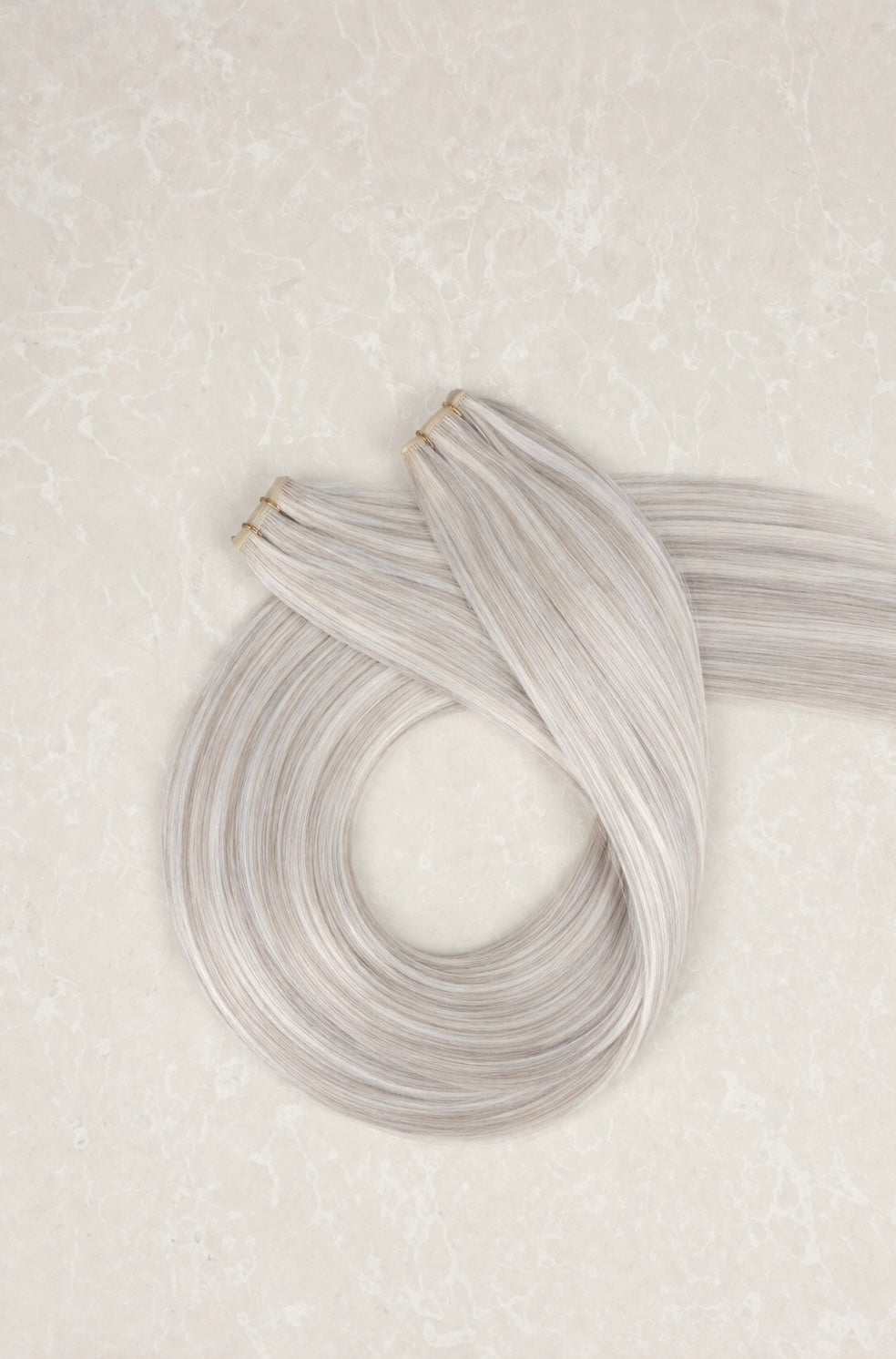 16" Genius Weft Human Hair Extensions. Snowflake #P1004/Silver