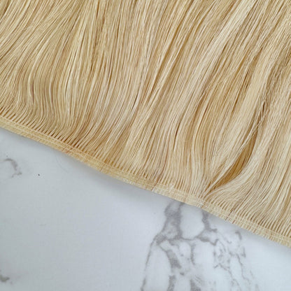 30" Tape Weft #12C Champagne Blonde Human Hair Extensions - Lucy