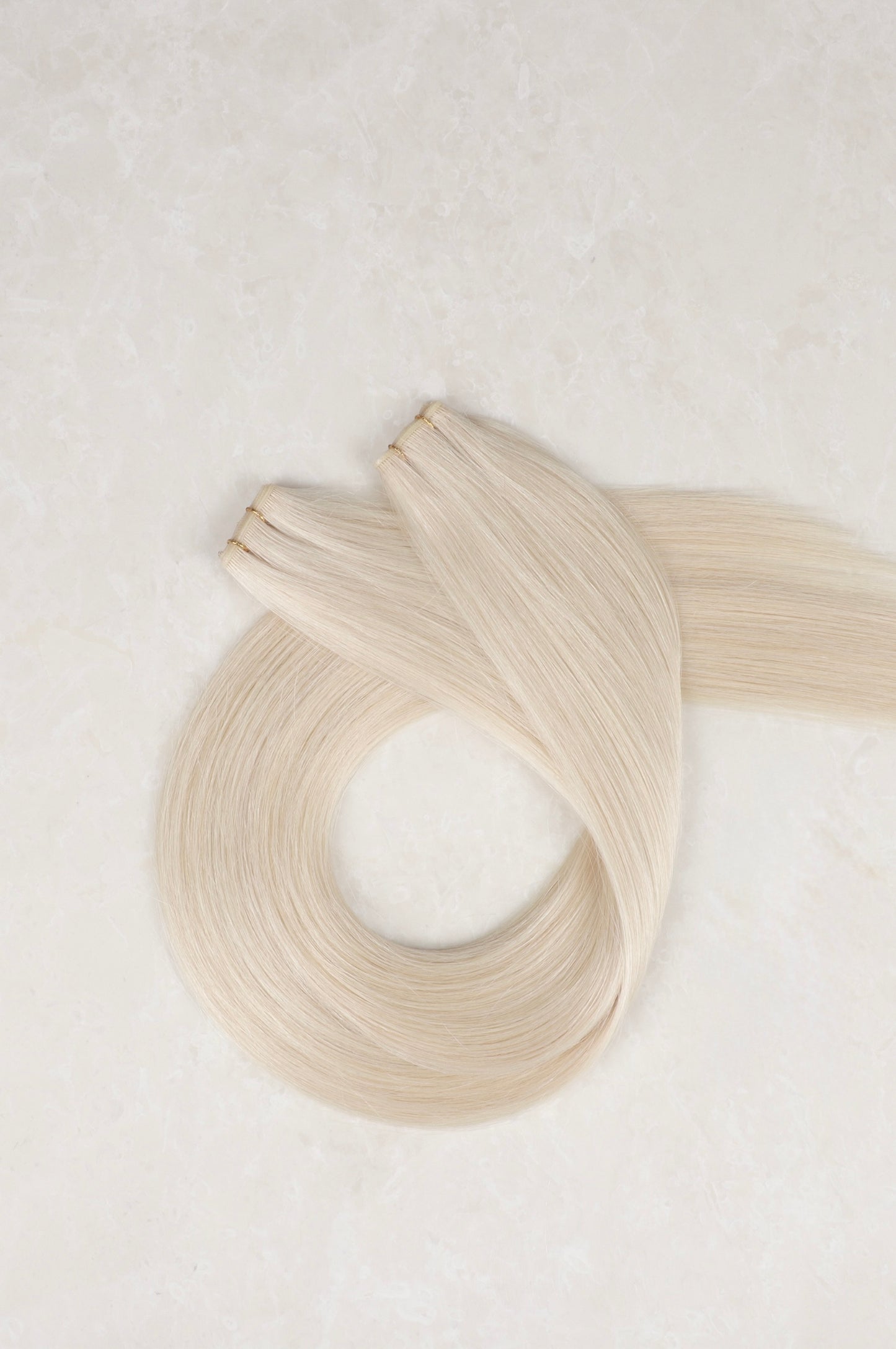 16" Genius Weft Human Hair Extensions. White Blonde #1004
