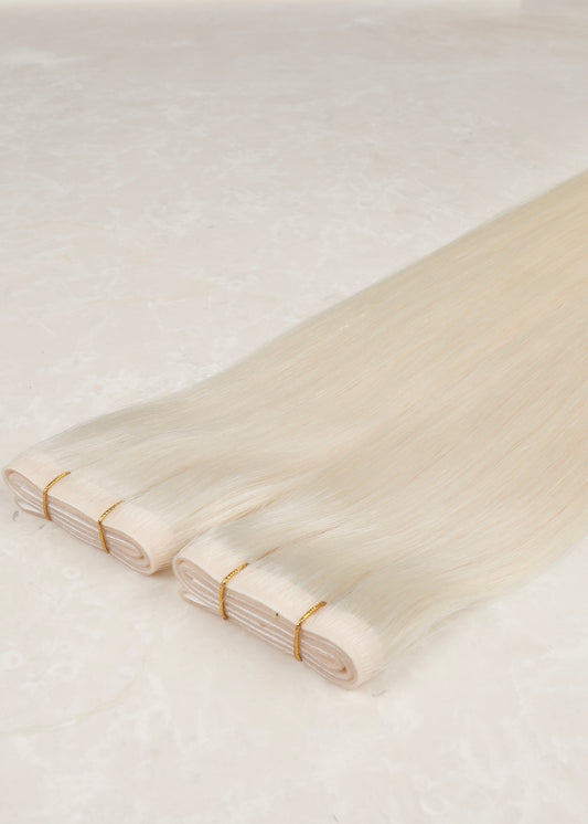 Invisible Tape Weft Human Hair Extensions. Vanilla Blonde