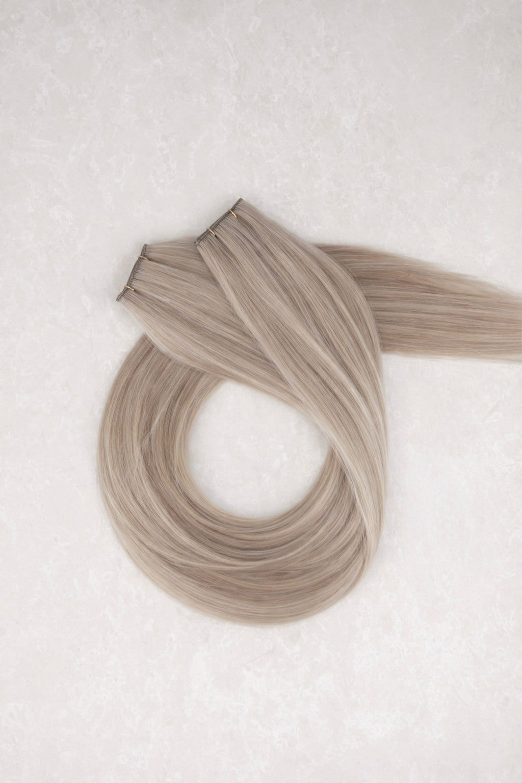 28" Genius Weft Human Hair Extensions. Mid Mushroom Blonde