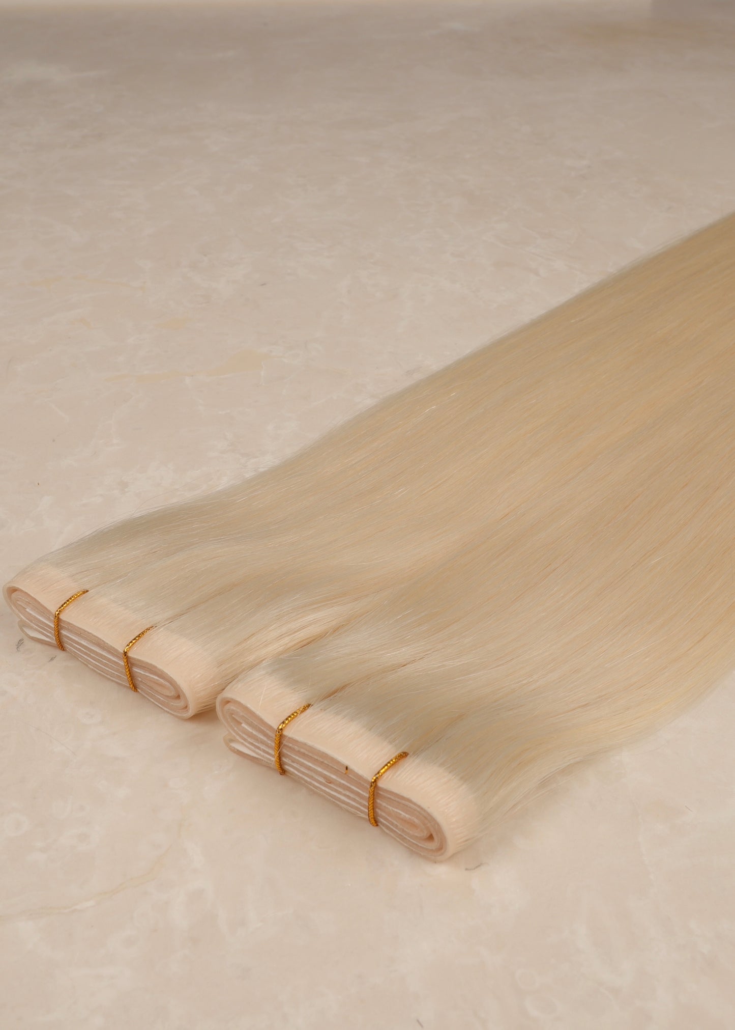 Invisible Tape Weft Human Hair Extensions. Platinum Blonde #1010