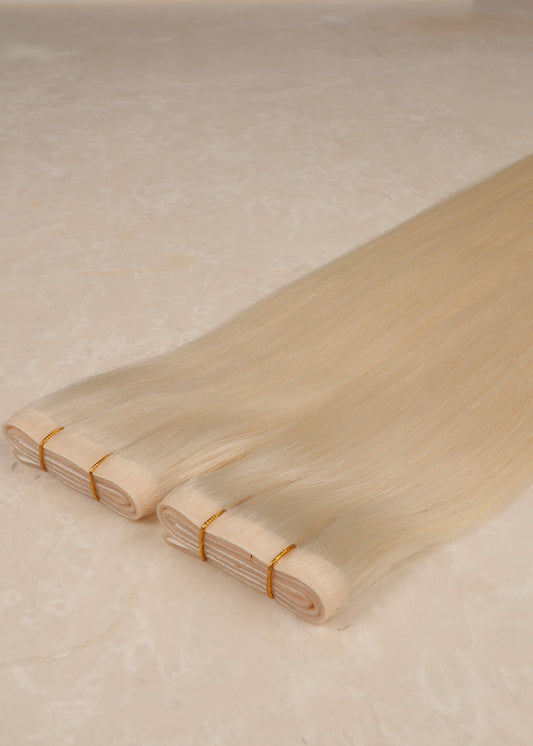 Invisible Tape Weft Human Hair Extensions. Platinum Blonde #1010