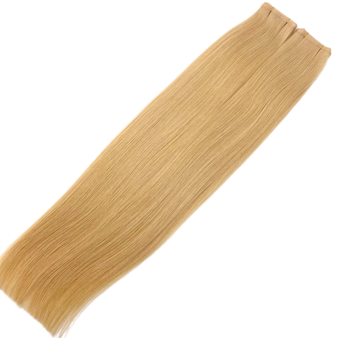 22" Tape Weft #12 Strawberry Blonde Human Hair Extensions - Olivia