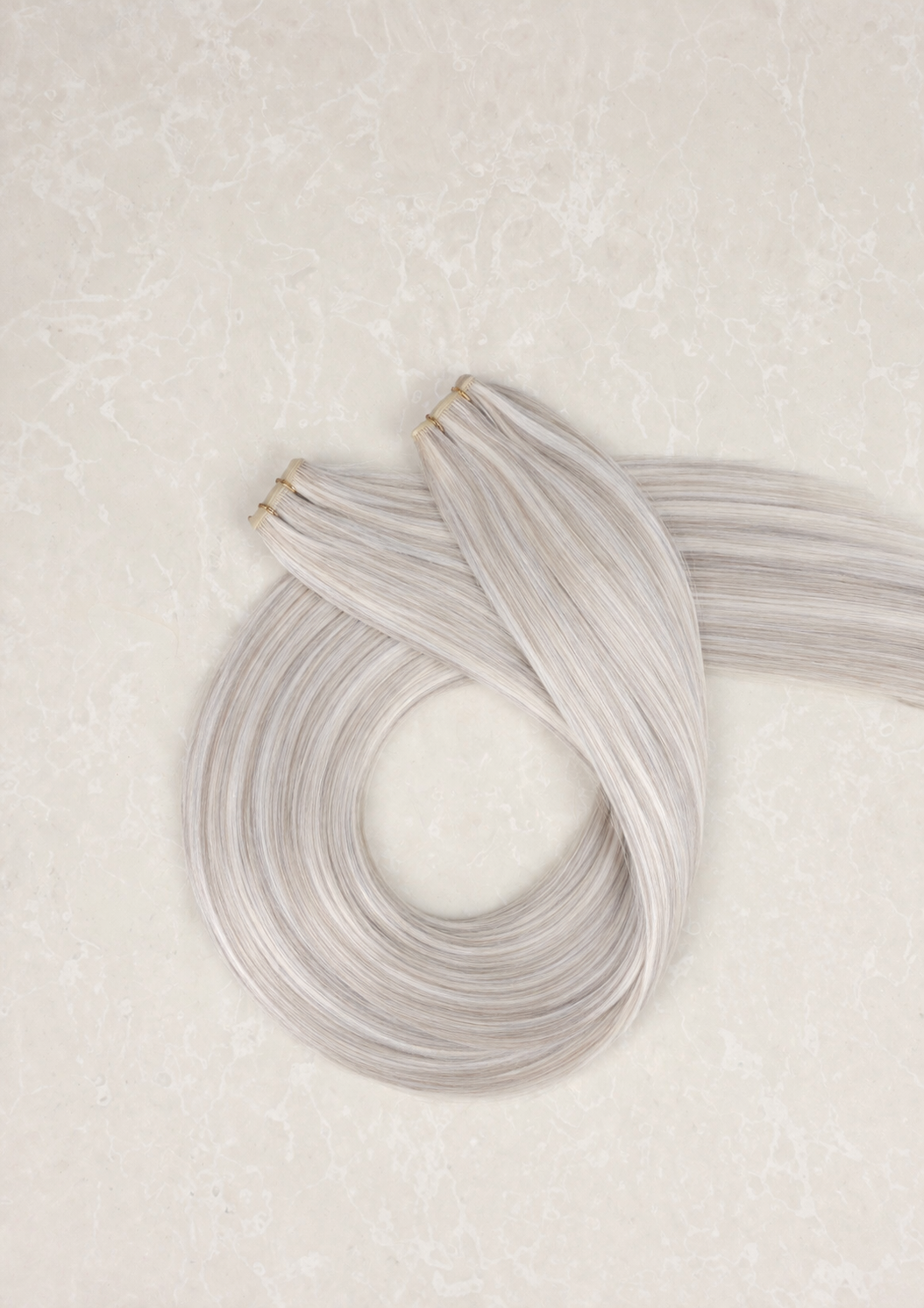 28" Genius Weft Human Hair Extensions. Snowflake #P1004/Silver