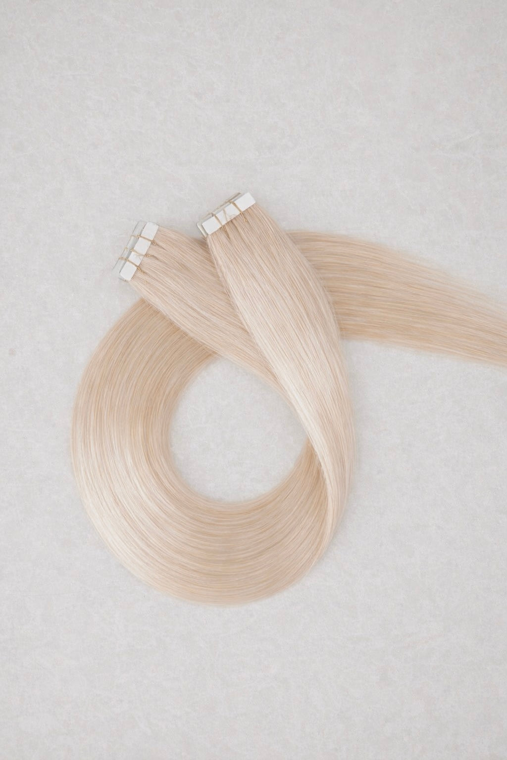 28" Invisible Tape Human Hair Extensions. Champagne Blonde #20