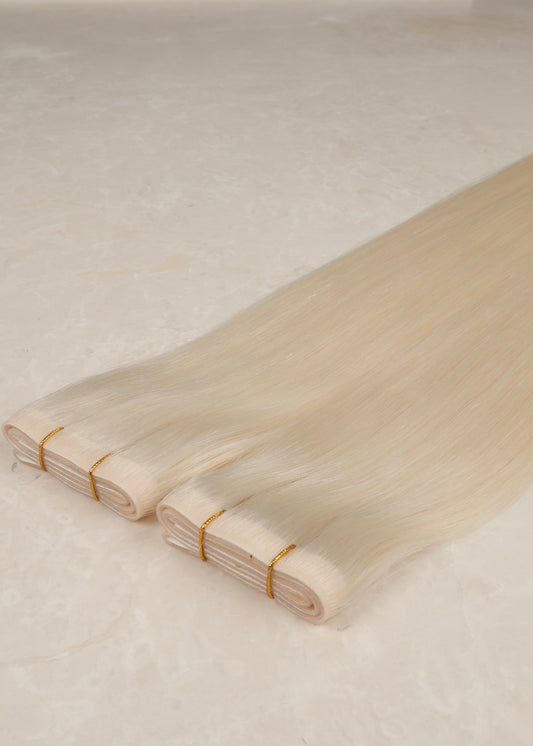 Invisible Tape Weft Human Hair Extensions. White Blonde #1004