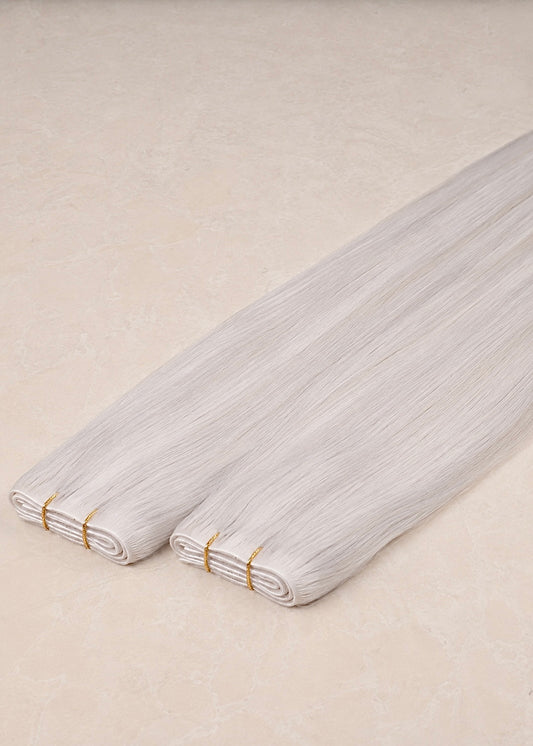 Invisible Tape Weft Human Hair Extensions. Light Silver