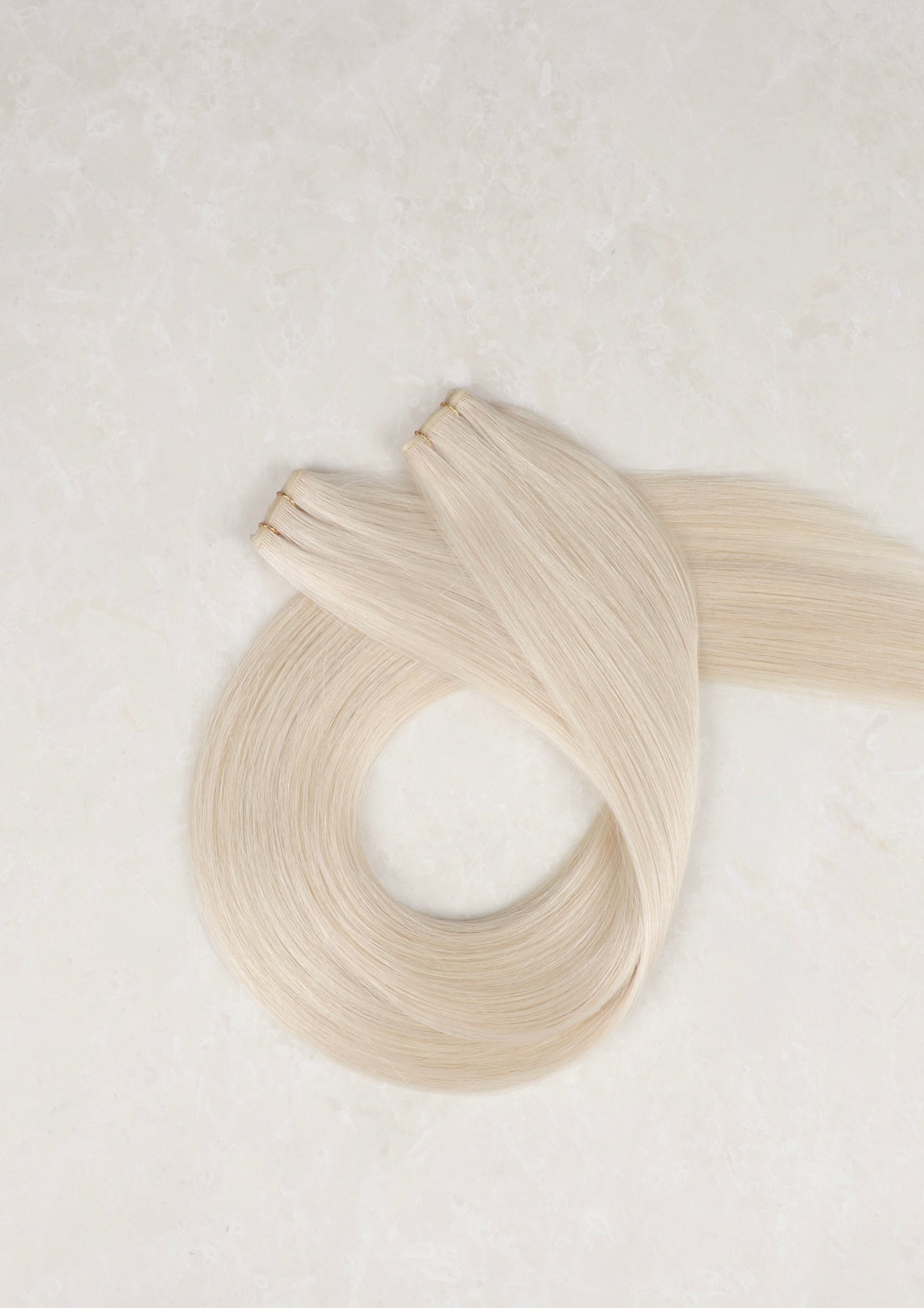 18" Genius Weft Human Hair Extensions. White Blonde #1004