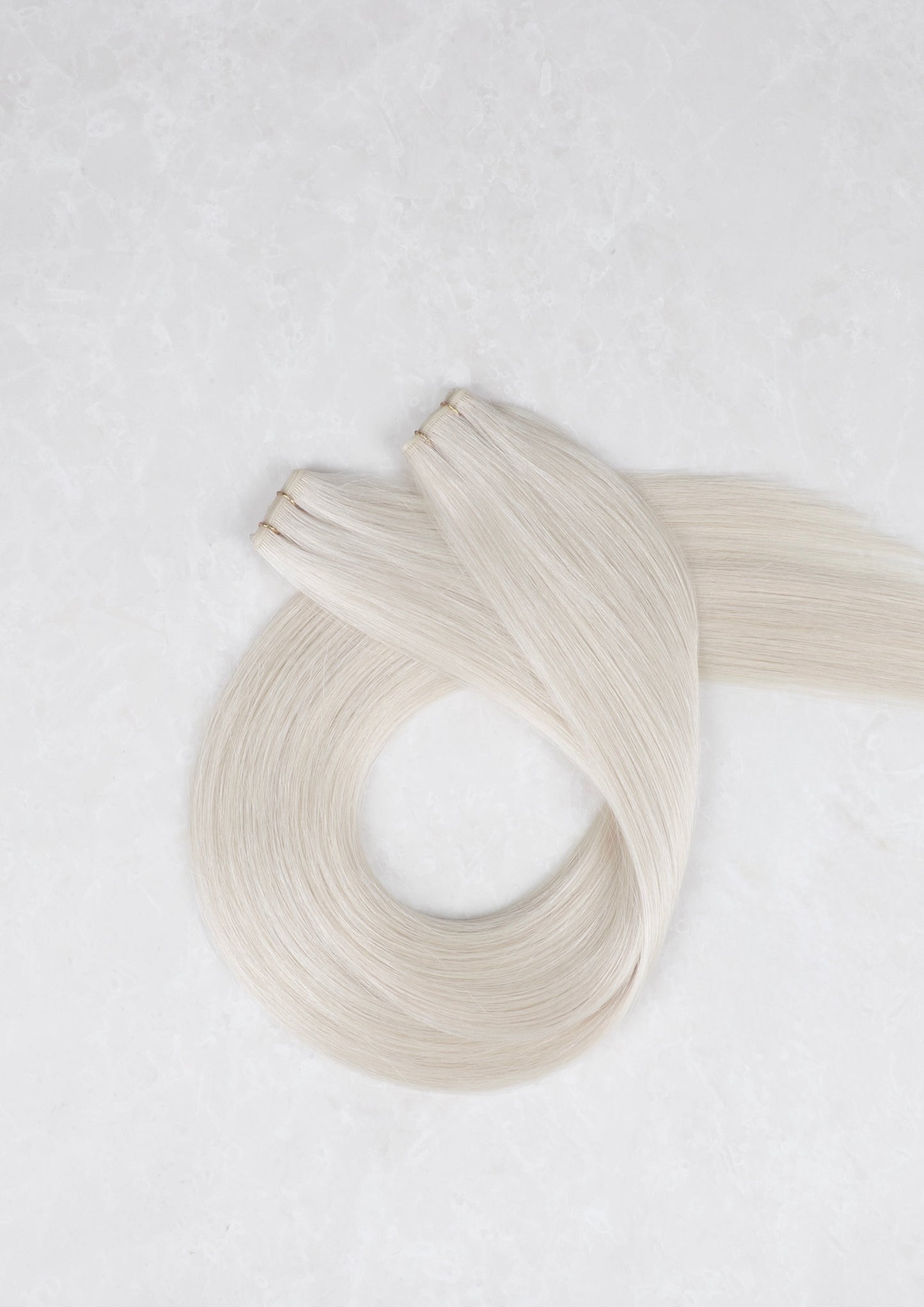 24" Genius Weft Human Hair Extensions. Vanilla Blonde