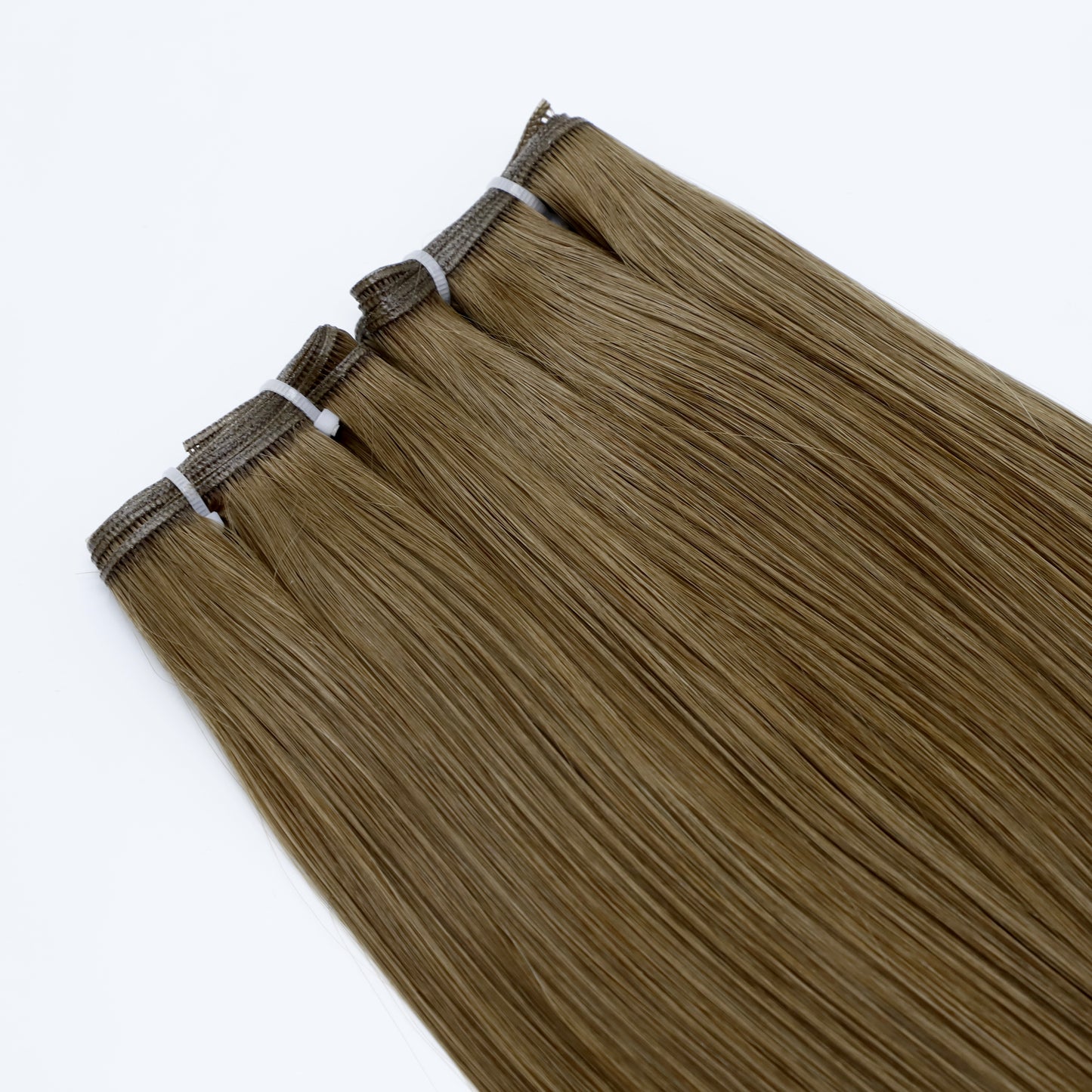 Genius Weft Human Hair Extensions. Luxe Platinum Range
