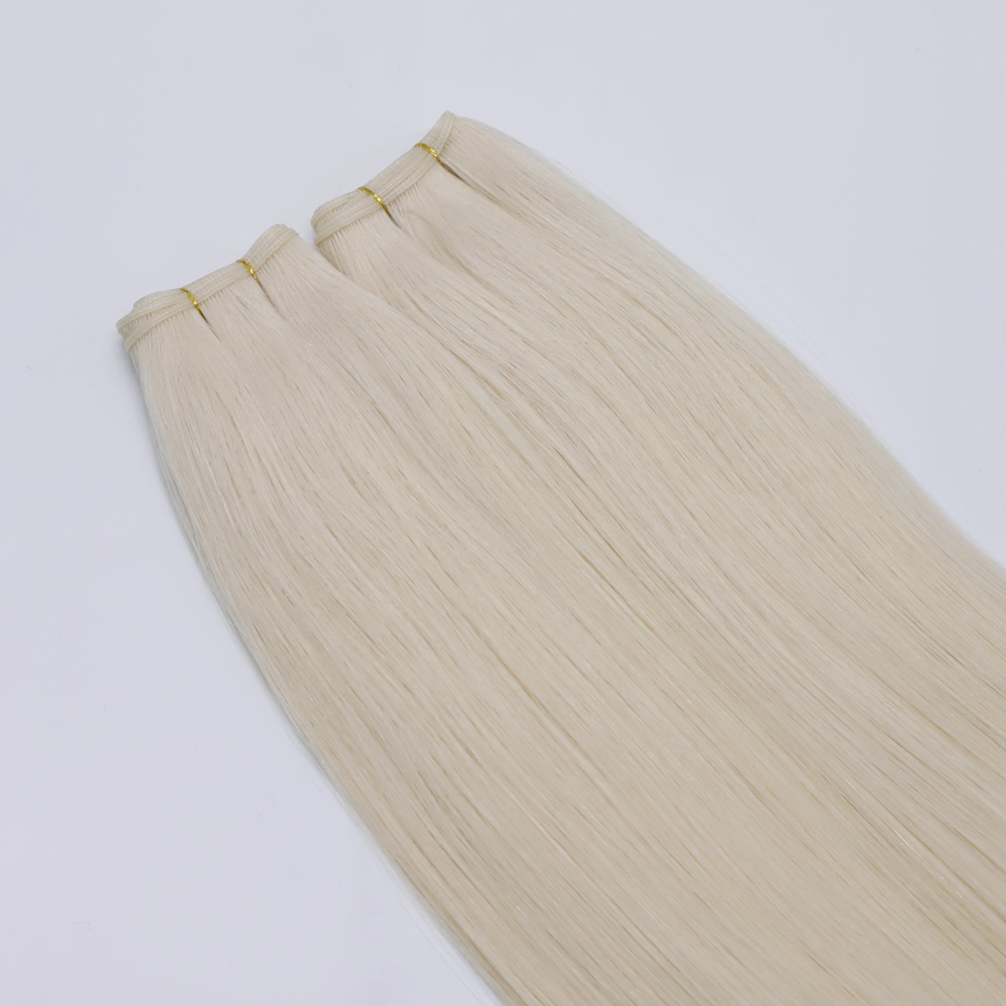Genius Weft Human Hair Extensions. Luxe Platinum Range